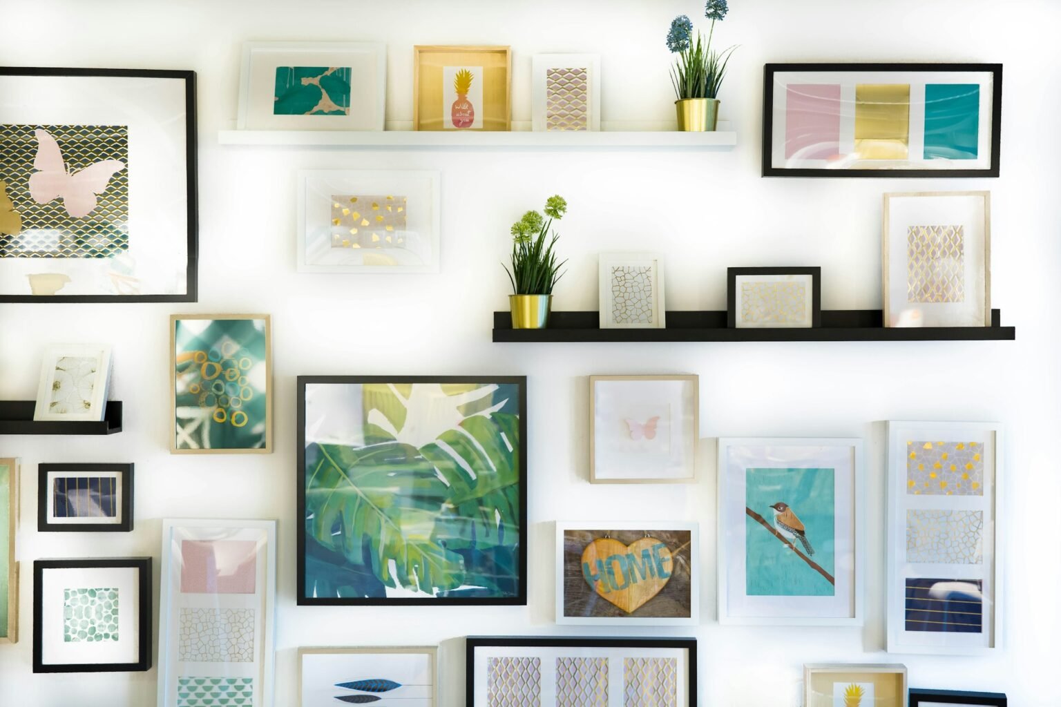 11x14 picture frame ideas: framed art prints hung on a living room wall