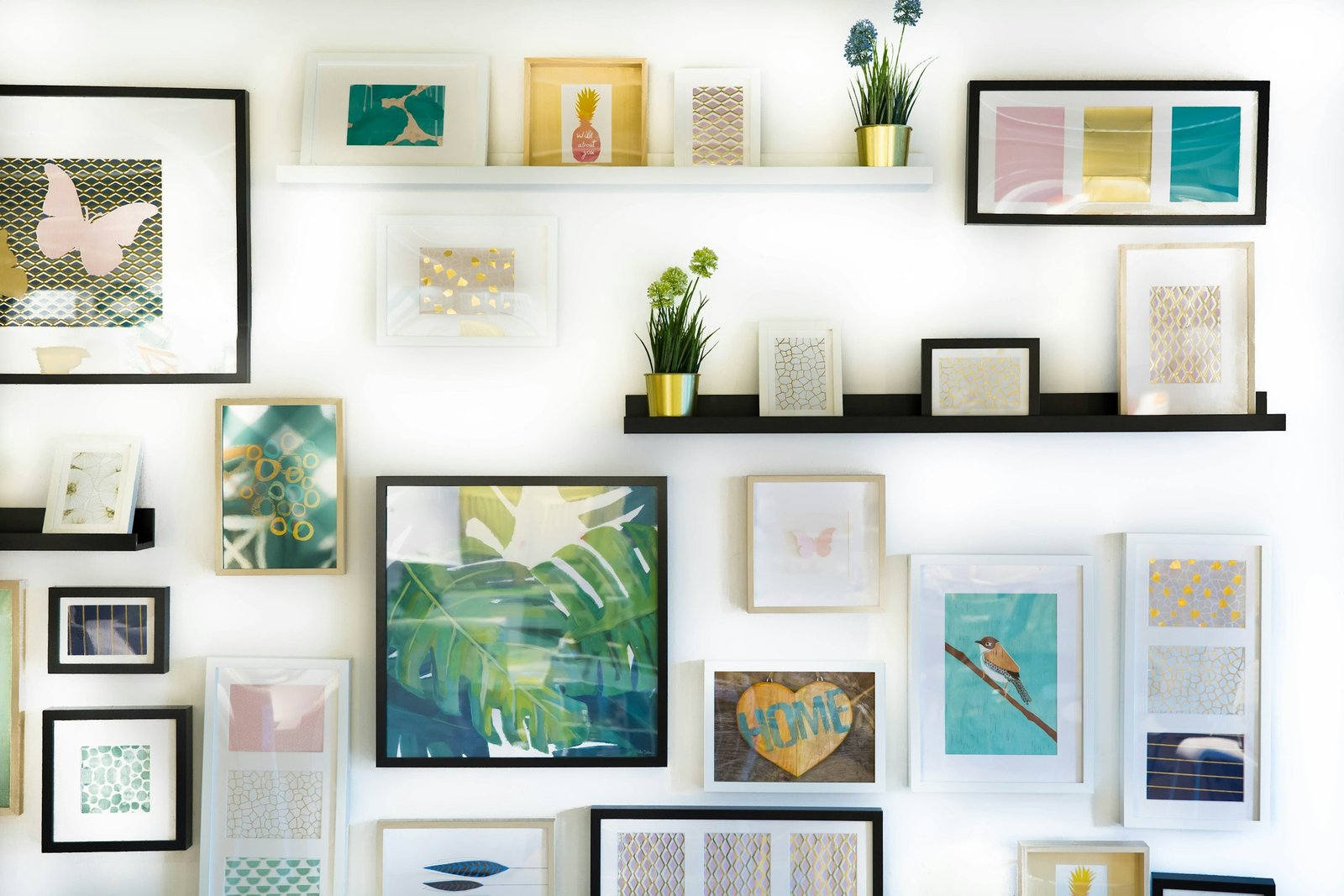 11x14 picture frame ideas: framed art prints hung on a living room wall