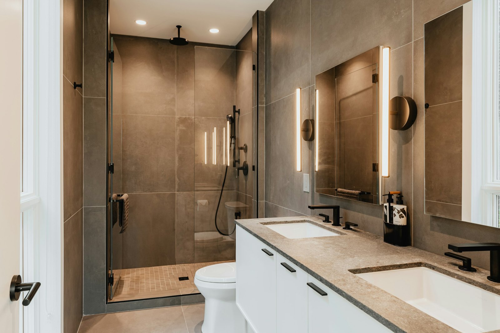 Adhesive shower caddy idea: clean modern bathroom with a walk-in shower