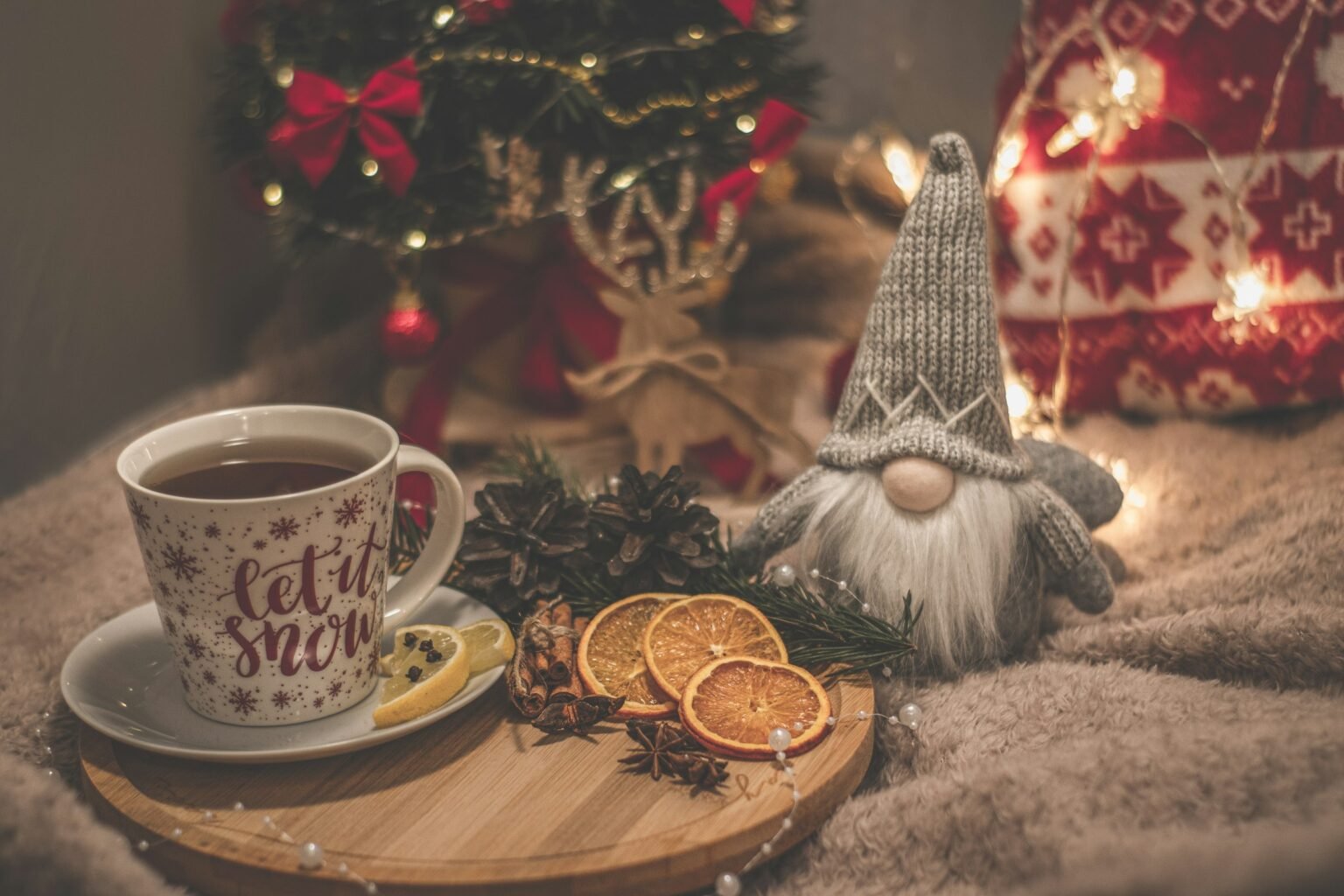 Amazon Christmas decor finds: a gnome, fairy lights and a cozy throw for cozy Christmas decor