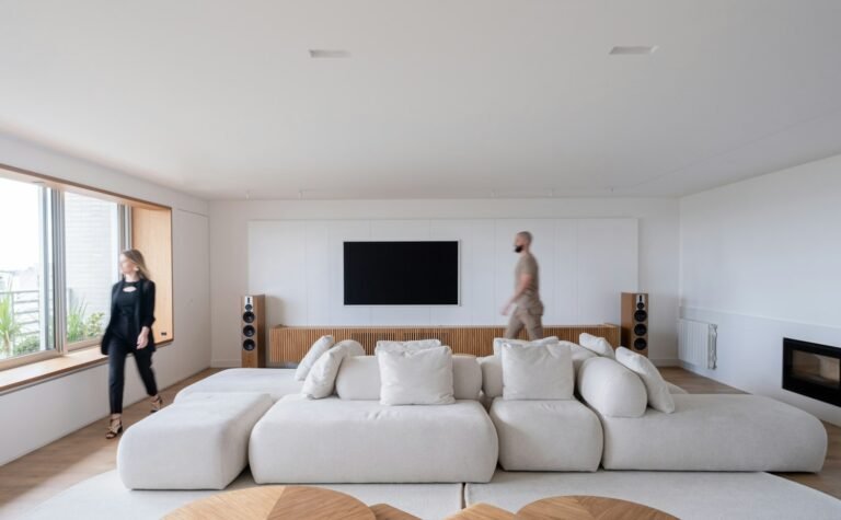 Cloud couch dupe: a white modular sectional with deep, rounded cushions in a bright living room