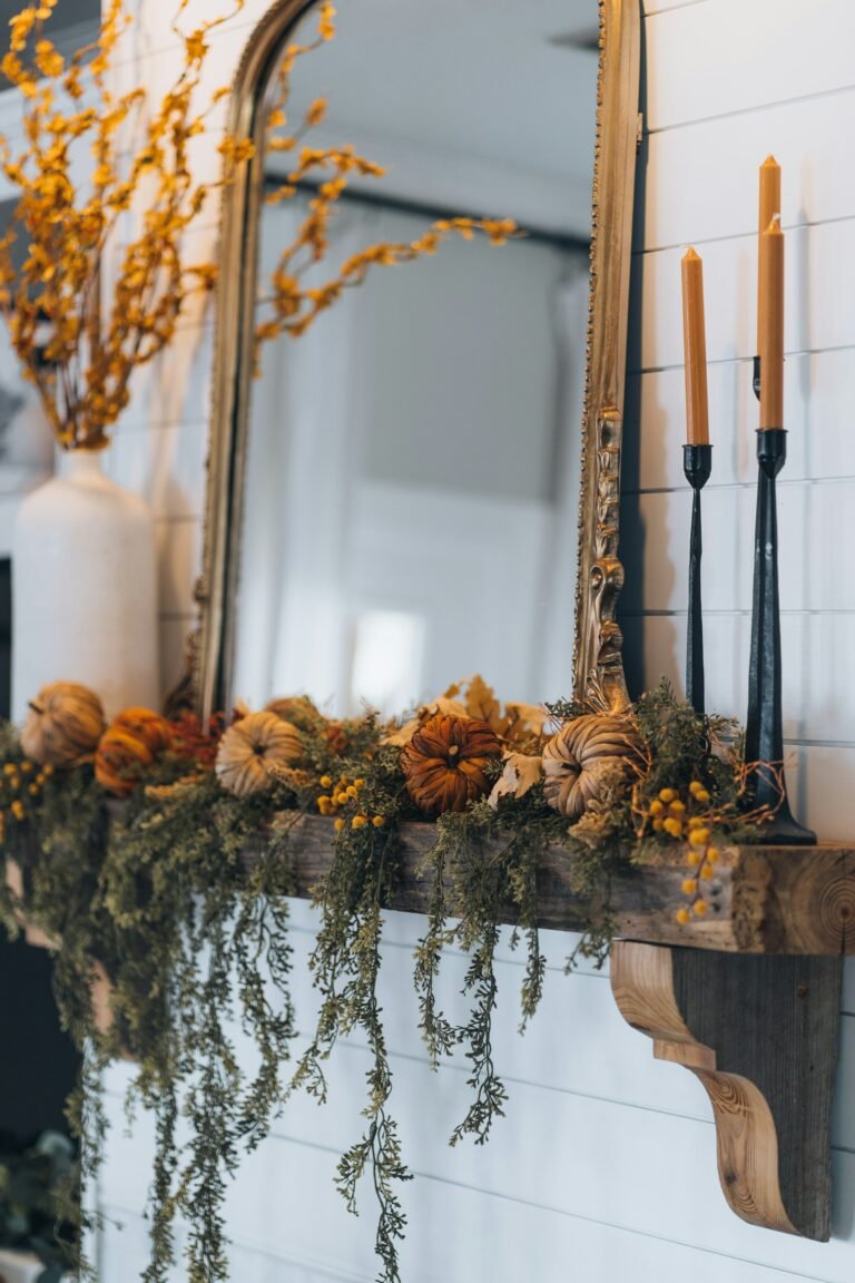Best fall garland draped with pumpkins in a cozy autumn home