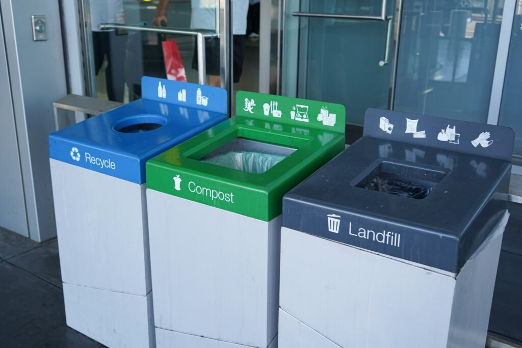 Dual compartment trash can idea: separate recycle, compost and landfill bins