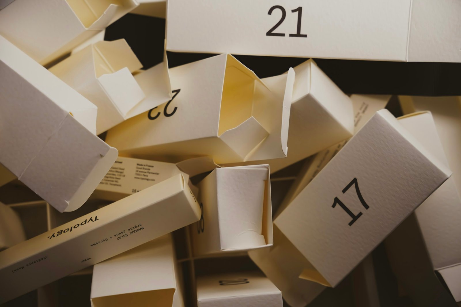 Skincare advent calendar boxes opened and numbered 17, 21 and 22 after a December countdown