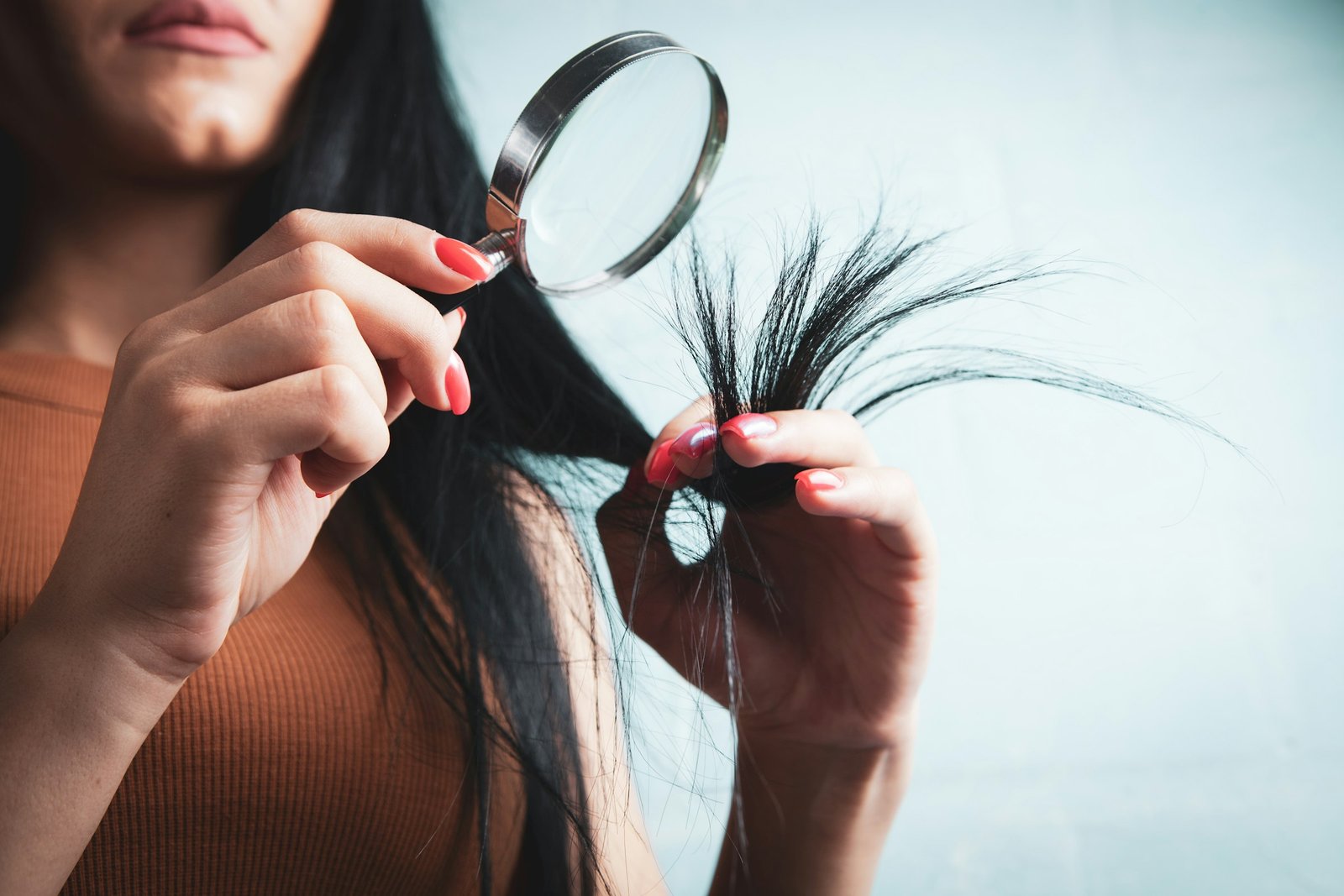 Checking split ends before choosing the best hair mask for damaged hair