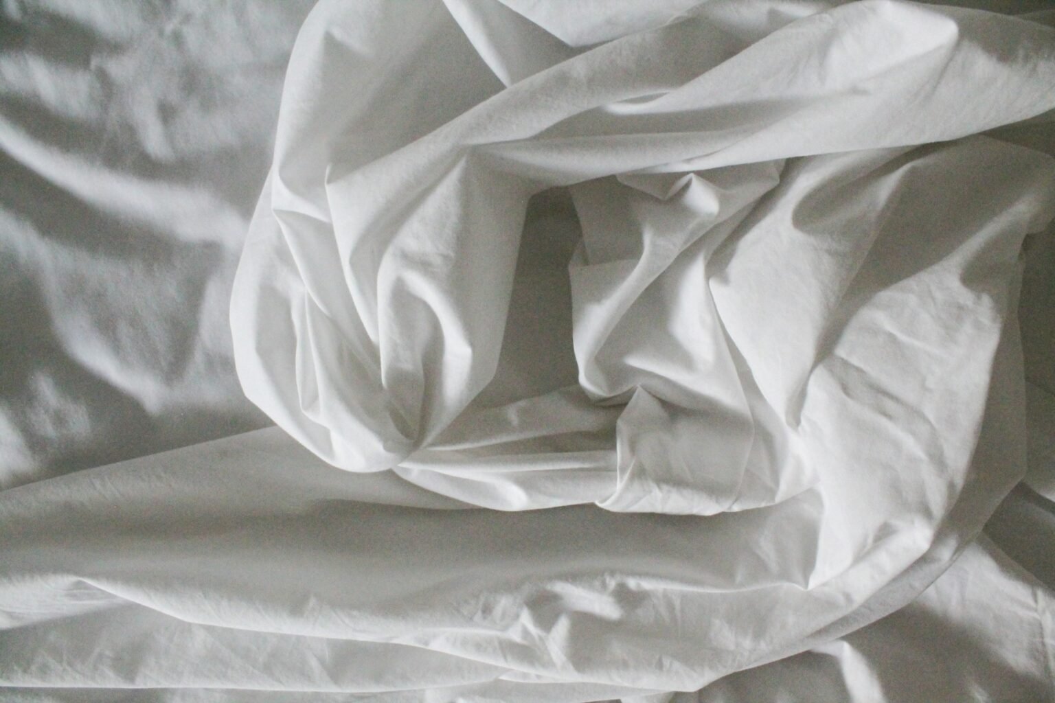 Best queen sheet sets on a neatly made bed with white pillows