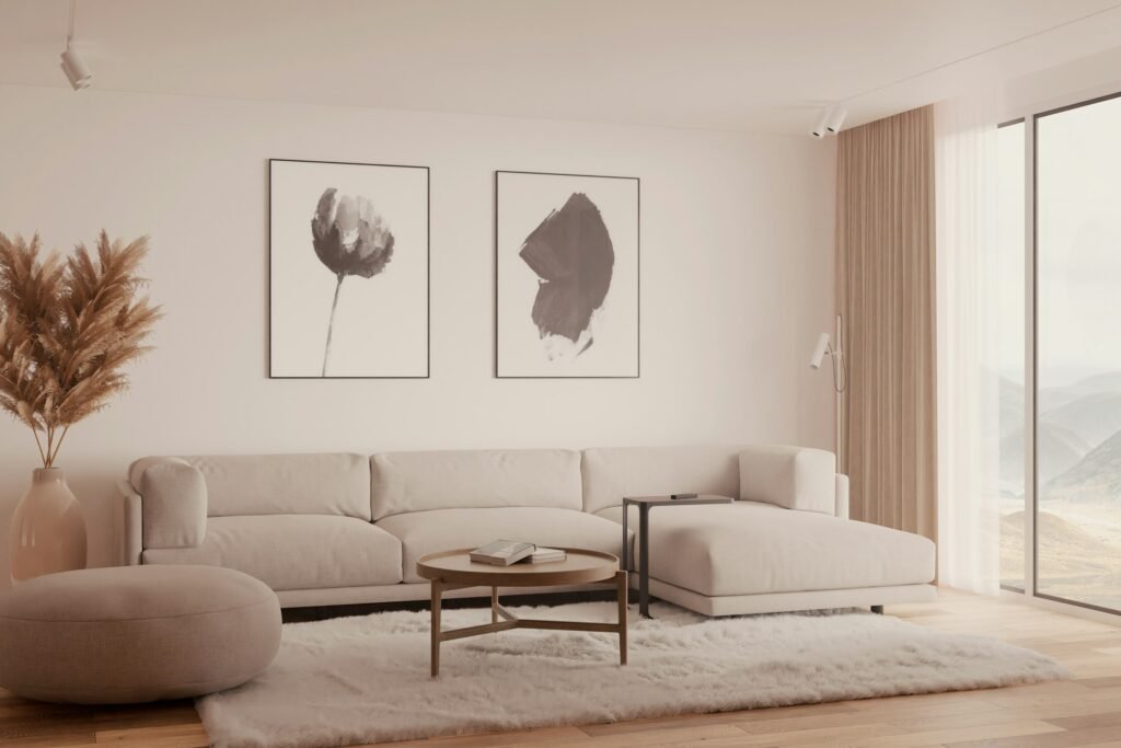 Best sectional for small living room: a cream L-shaped sectional with a right-facing chaise, round coffee table and shag rug