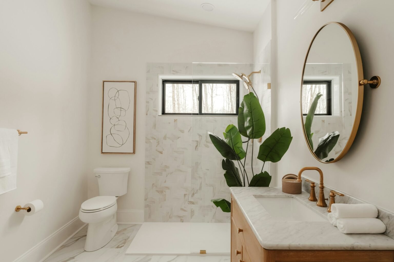 Modern bathroom with a plant, a good spot for a clean linen reed diffuser