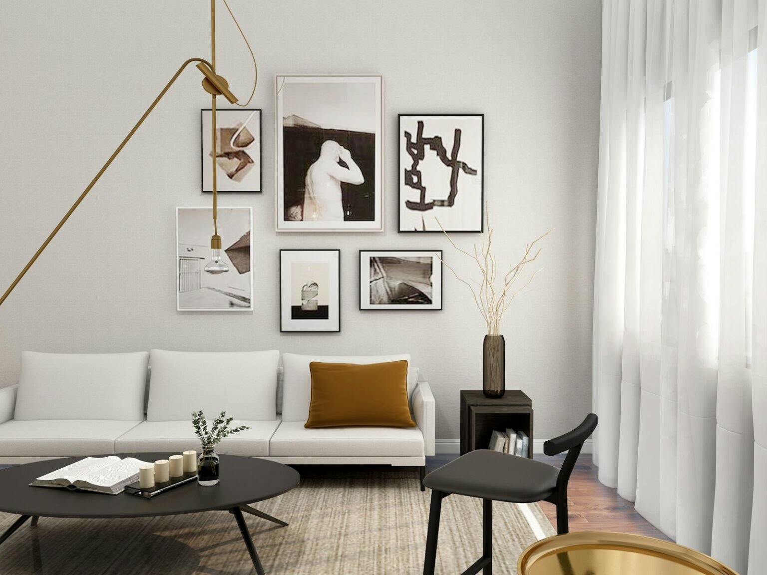 A white sofa with framed art and a mustard pillow