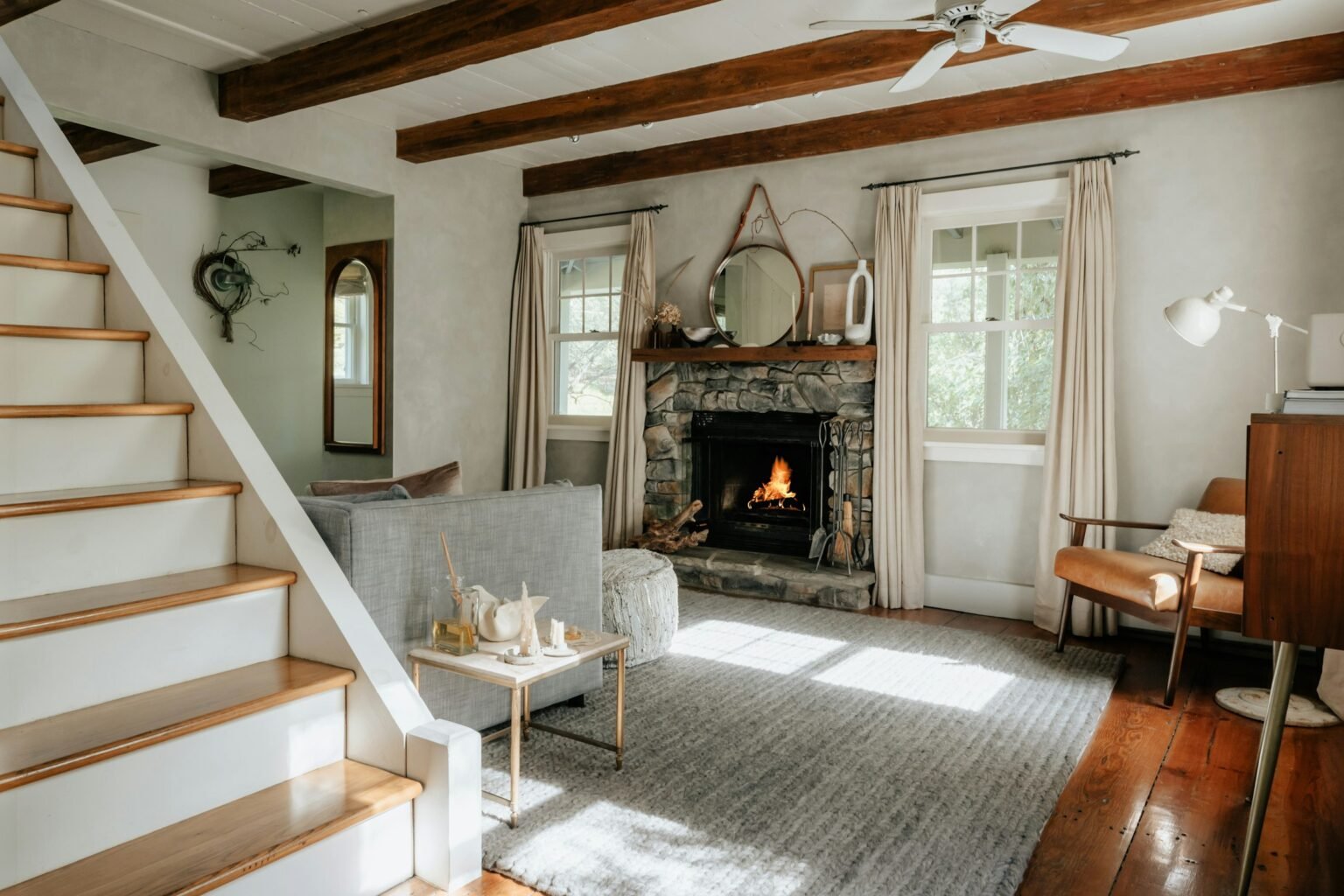 Cozy cabin-style living room that suits plug in diffuser refills with a woodsy teak scent