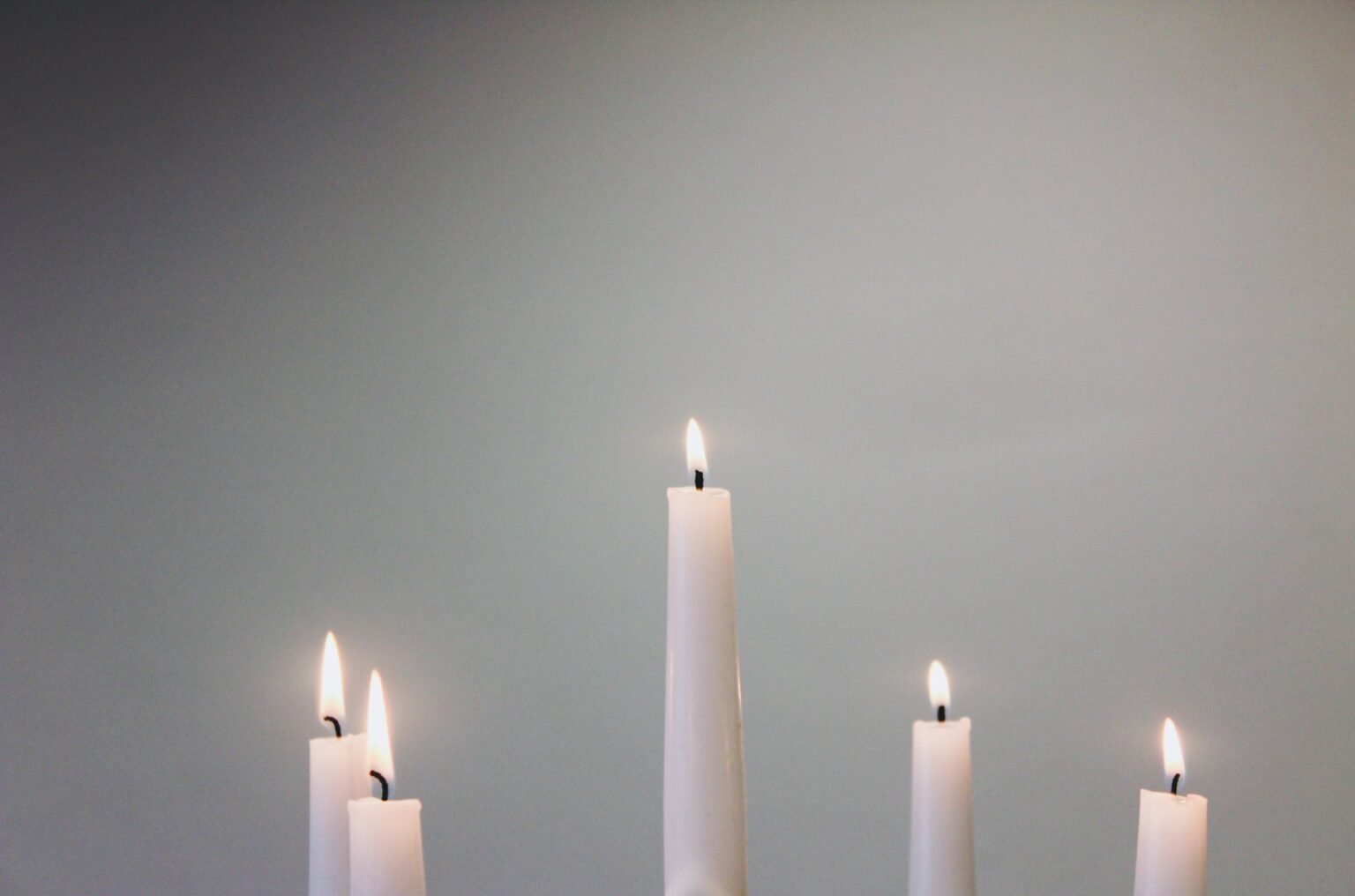White flameless taper candles style glow in candlesticks