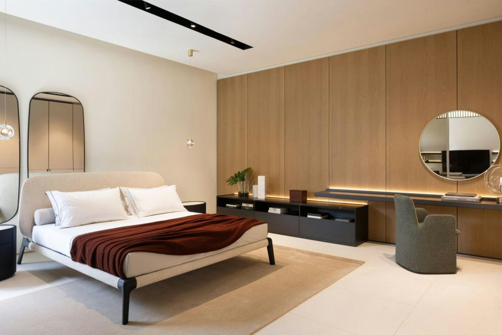 Full length standing mirror idea: tall narrow black-framed mirrors beside a bed in a modern bedroom