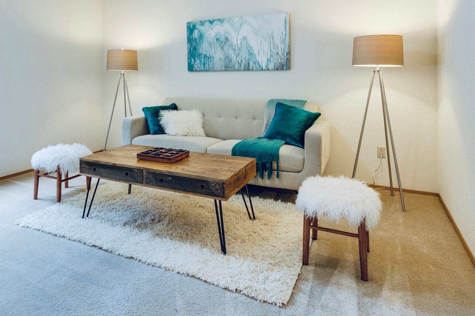 Gold floor lamp style lighting in a bright living room