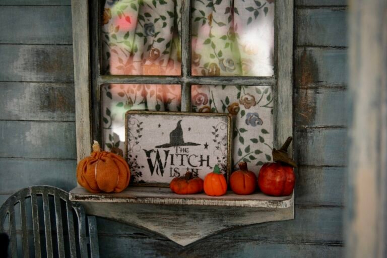 Halloween decorations on a budget with candles and pumpkins in a living room