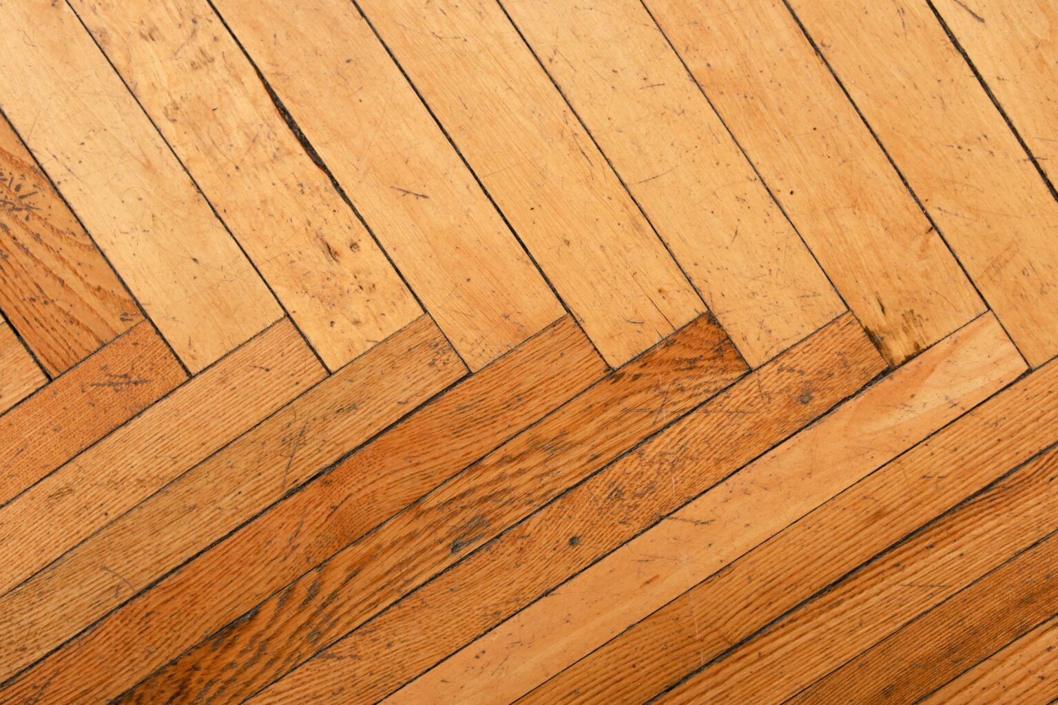 Hardwood floor refinishing cost: a herringbone wood floor