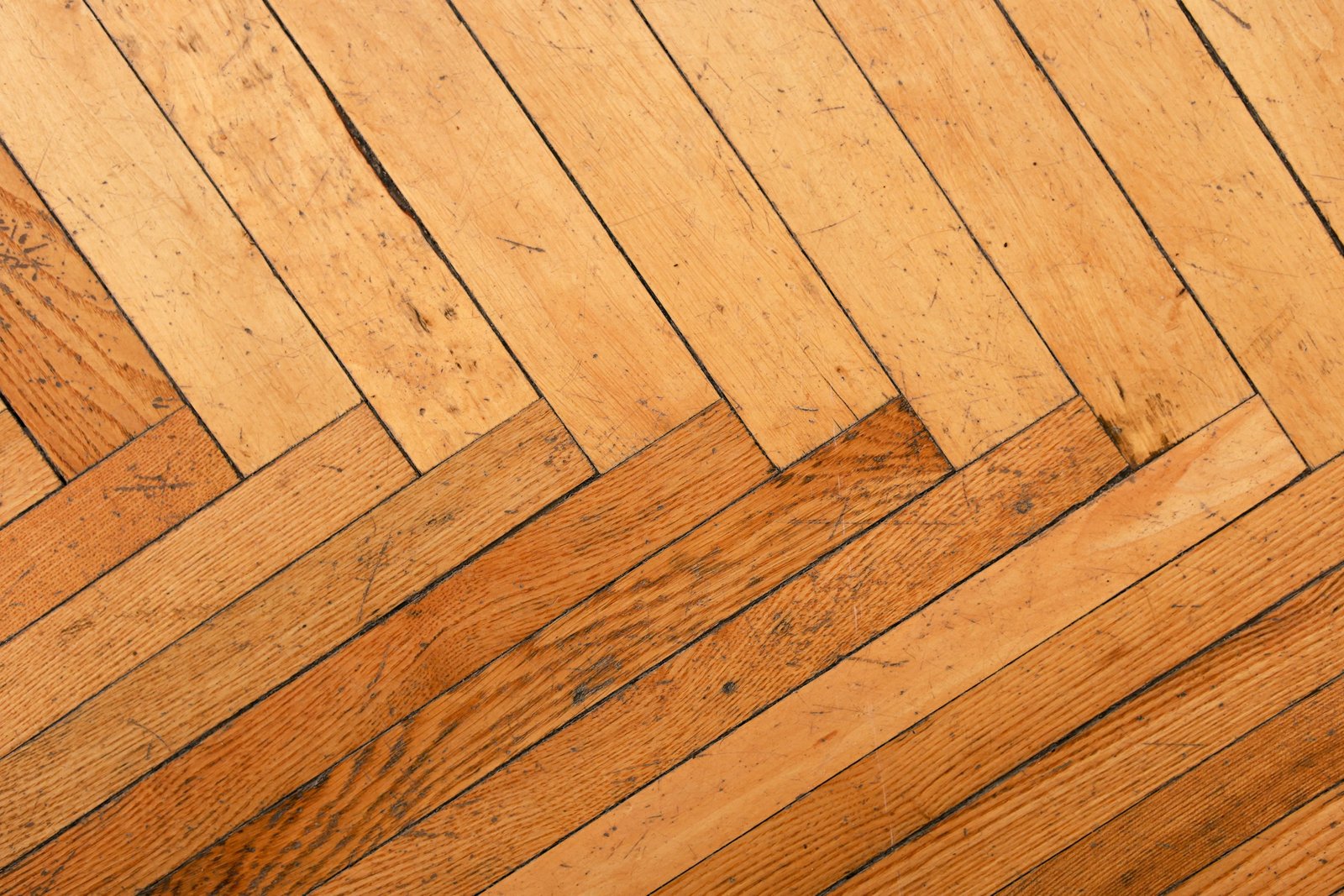 Hardwood floor refinishing cost: a herringbone wood floor