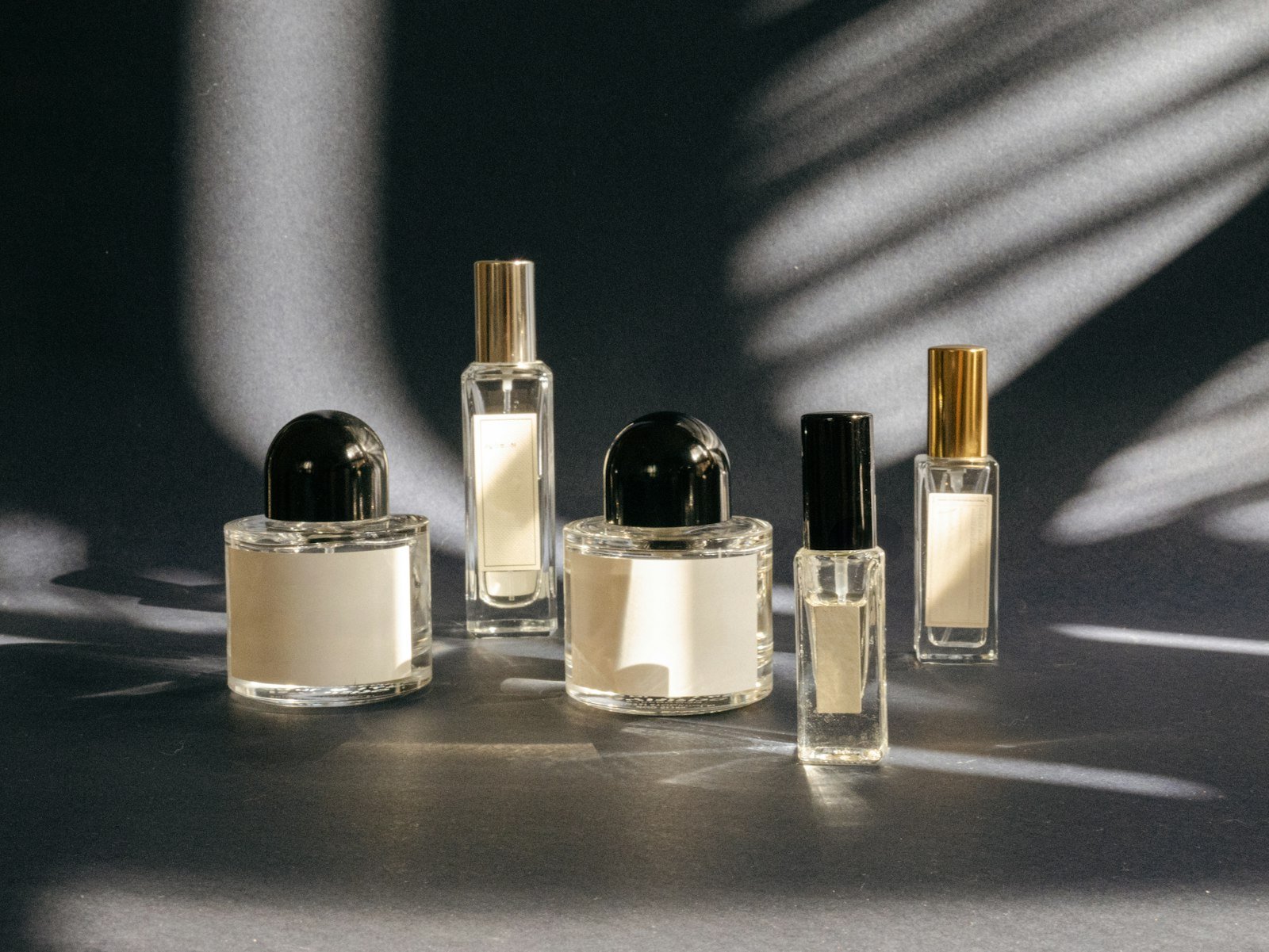 LOVERY perfume advent calendar review: a group of small glass perfume bottles on a table