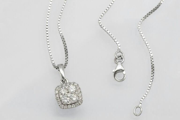 Sterling silver pendant necklace with box chain and lobster clasp, the kind of metal to check before buying a personalized necklace