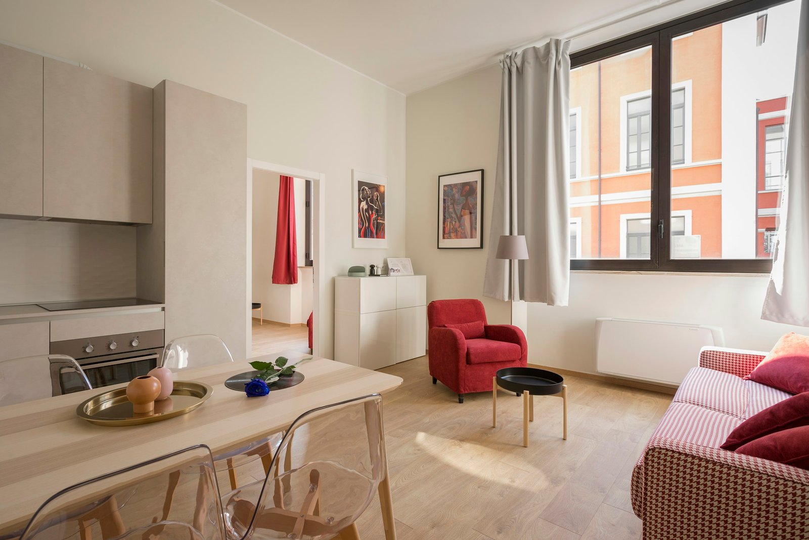 Tidy apartment room filled with furniture