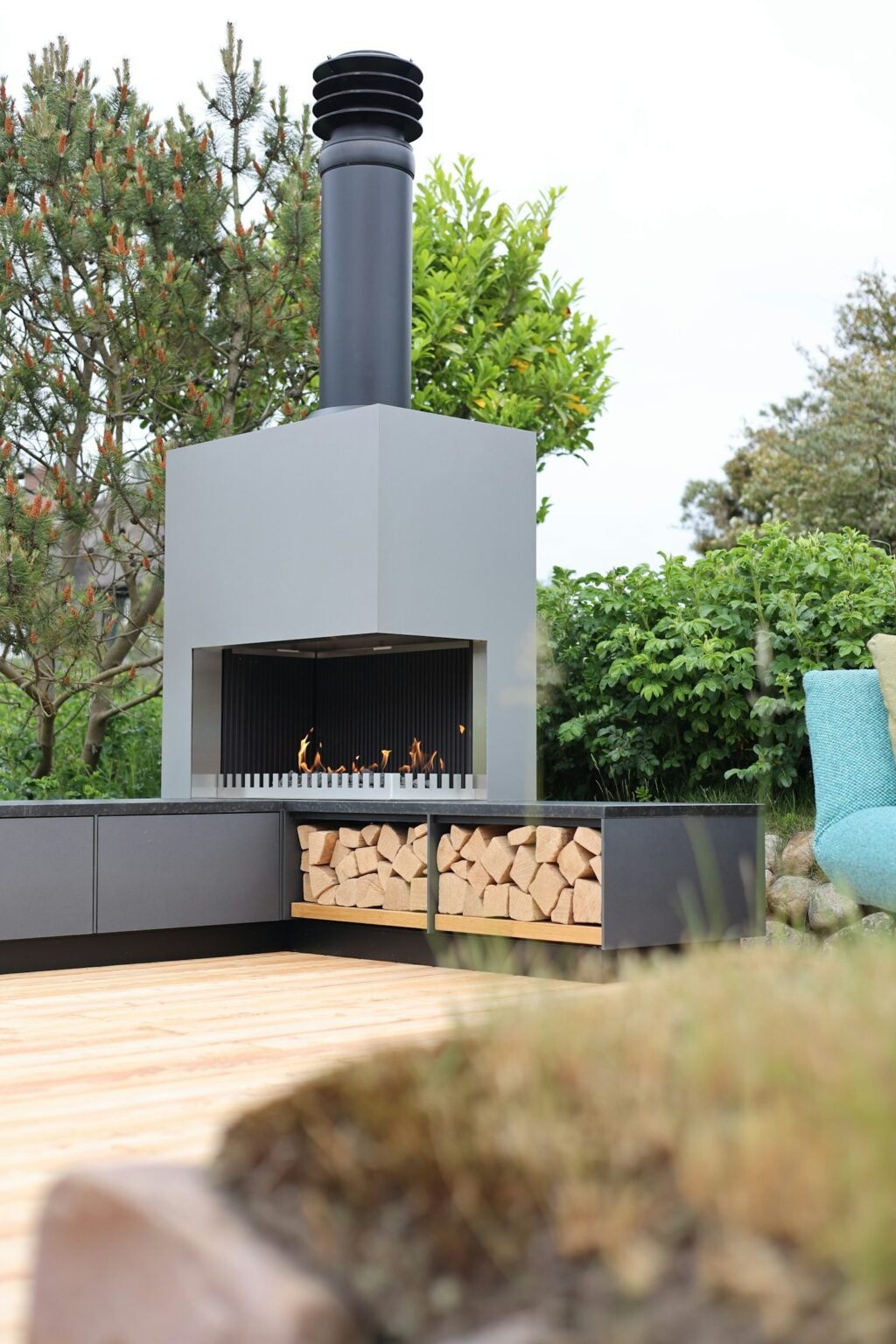 Outdoor fireplace on a wood deck