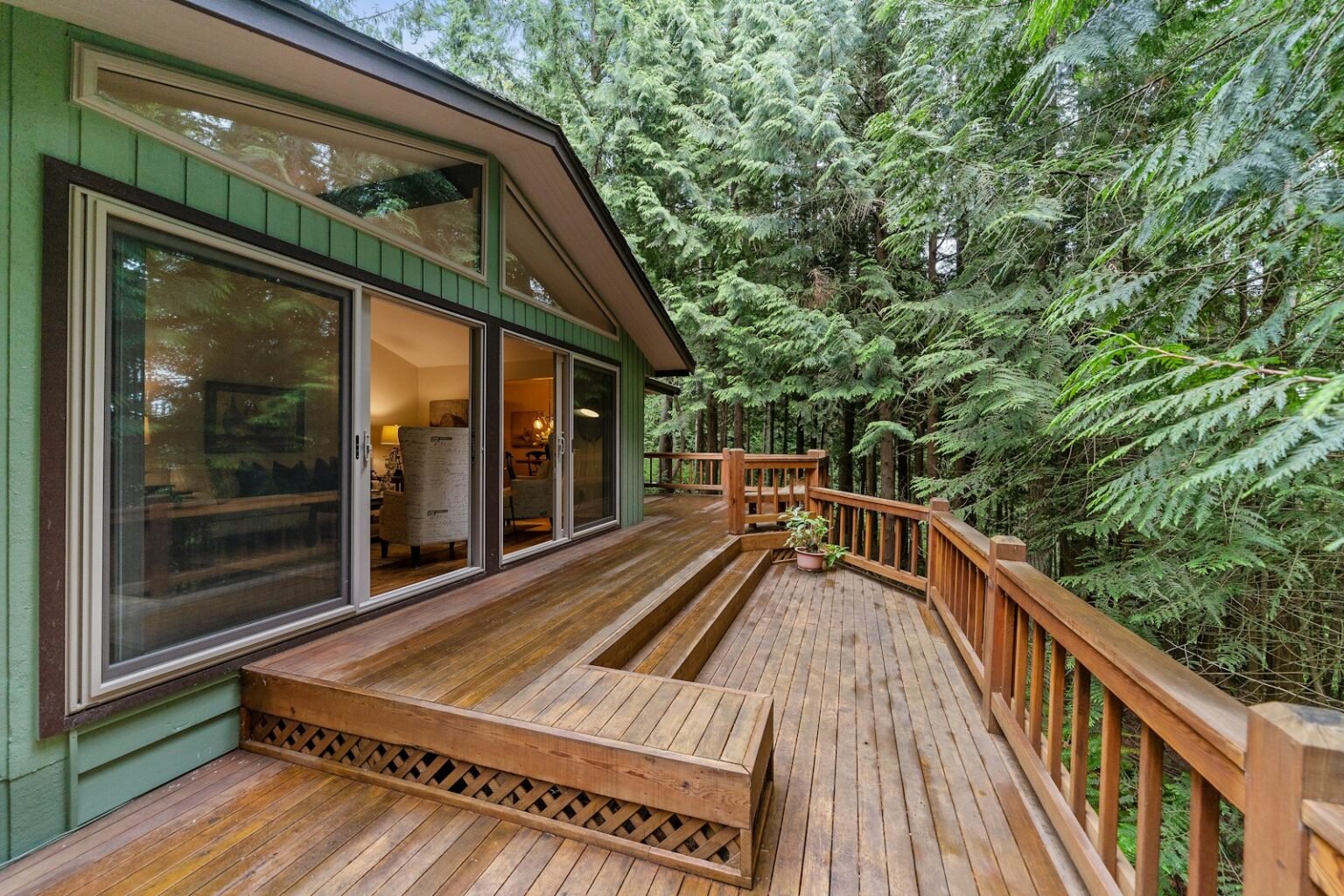Cost to build a deck – Wooden deck outside a glass door