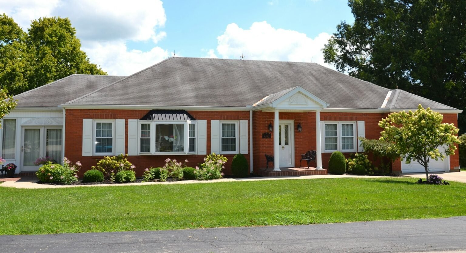 How much down payment for a house – Single-story red brick house