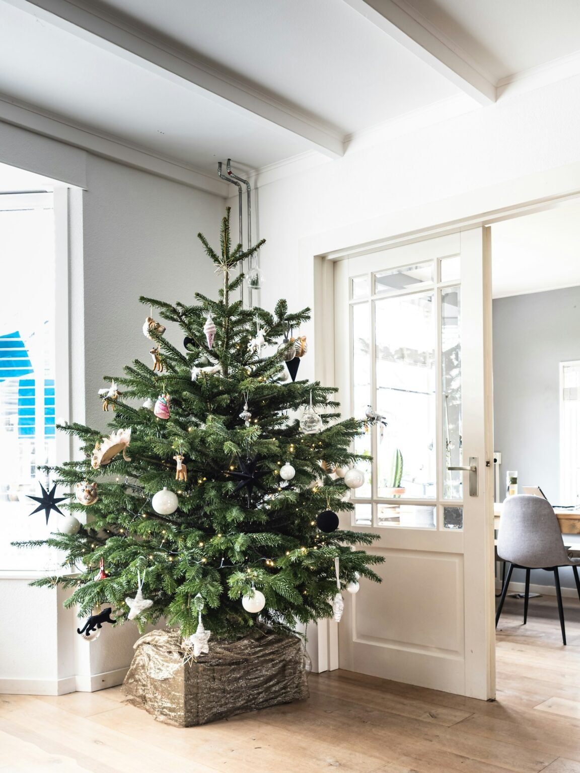 Full green Christmas tree with baubles