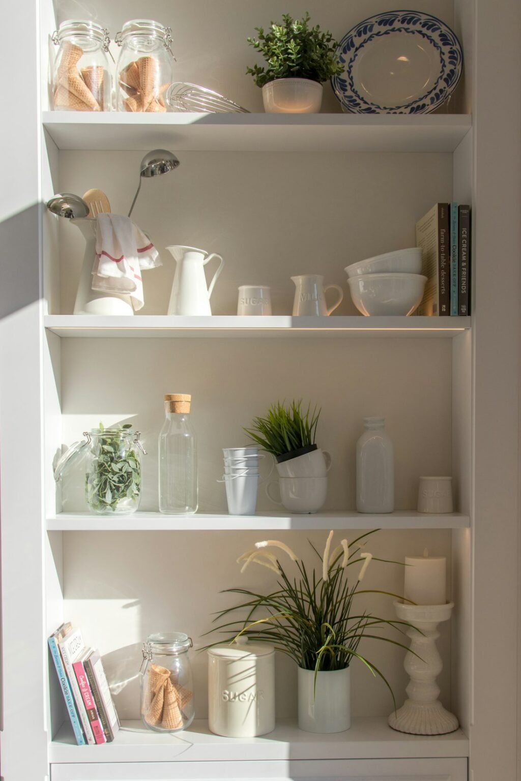 White shelves with vases