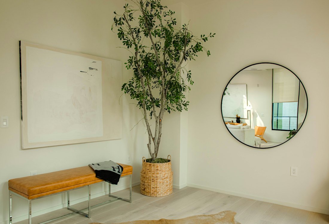 Round mirror in a living room