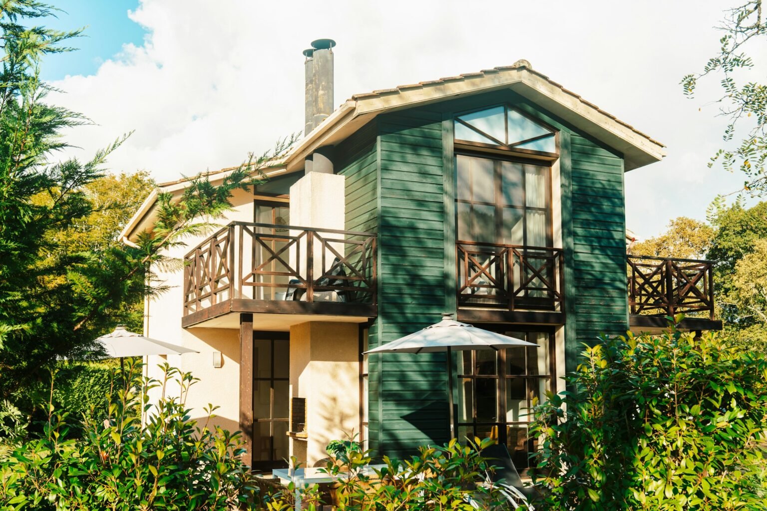 Charming house surrounded by green trees