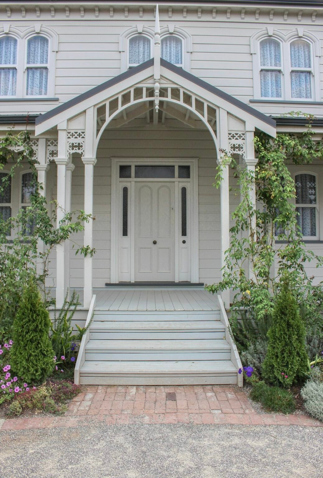 White front door with porch steps