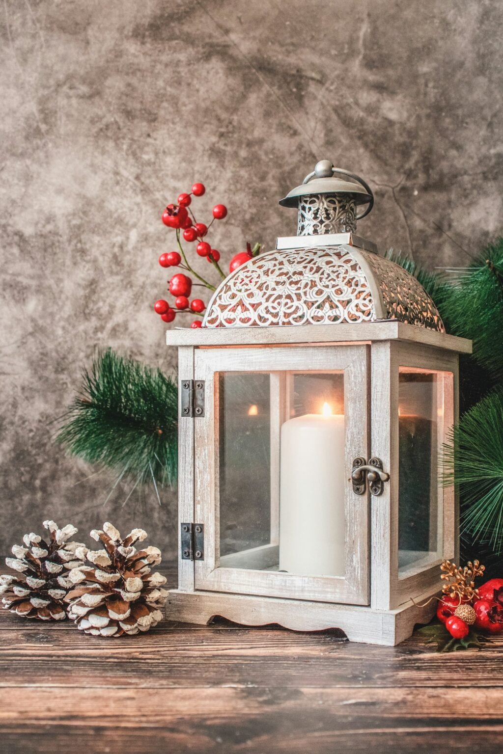 Pillar candle in a glass lantern