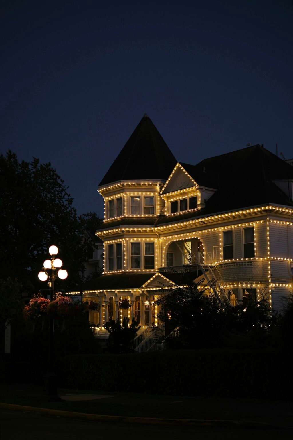 House decorated with lights at dusk