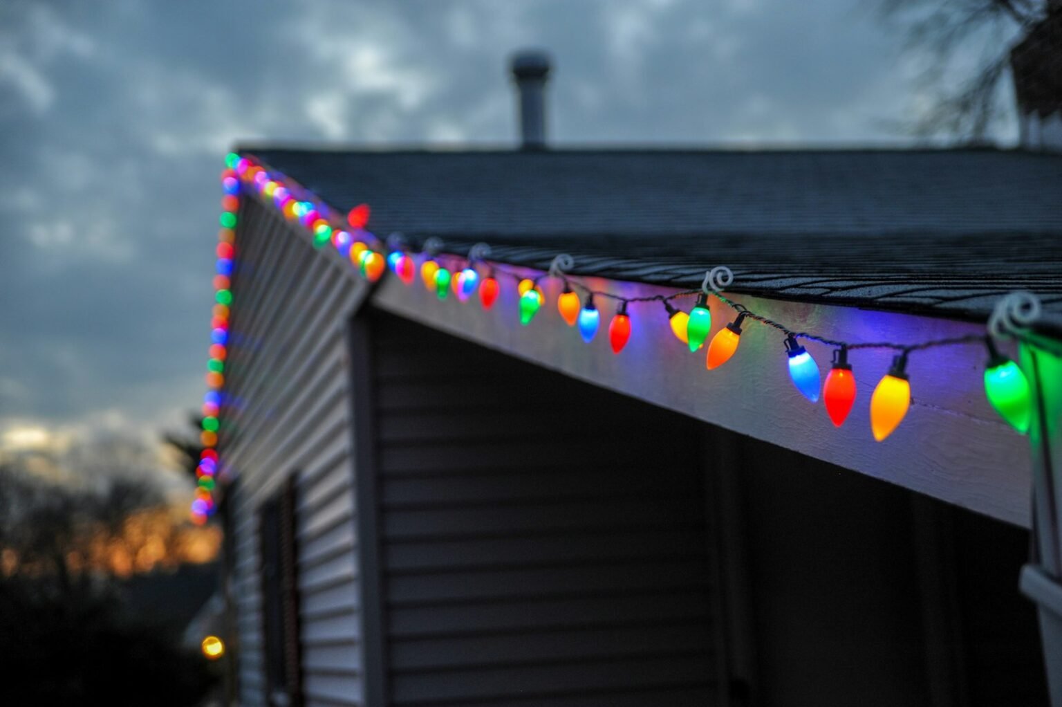 Christmas light installation cost – String lights along a roof line