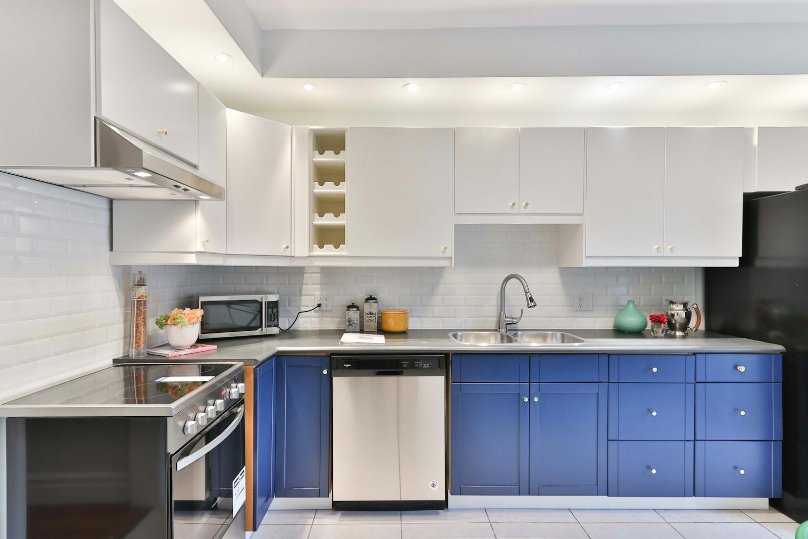 Kitchen with navy blue cabinets