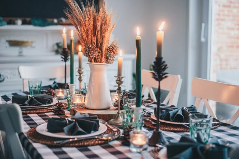Thanksgiving table set with candles and autumn decor