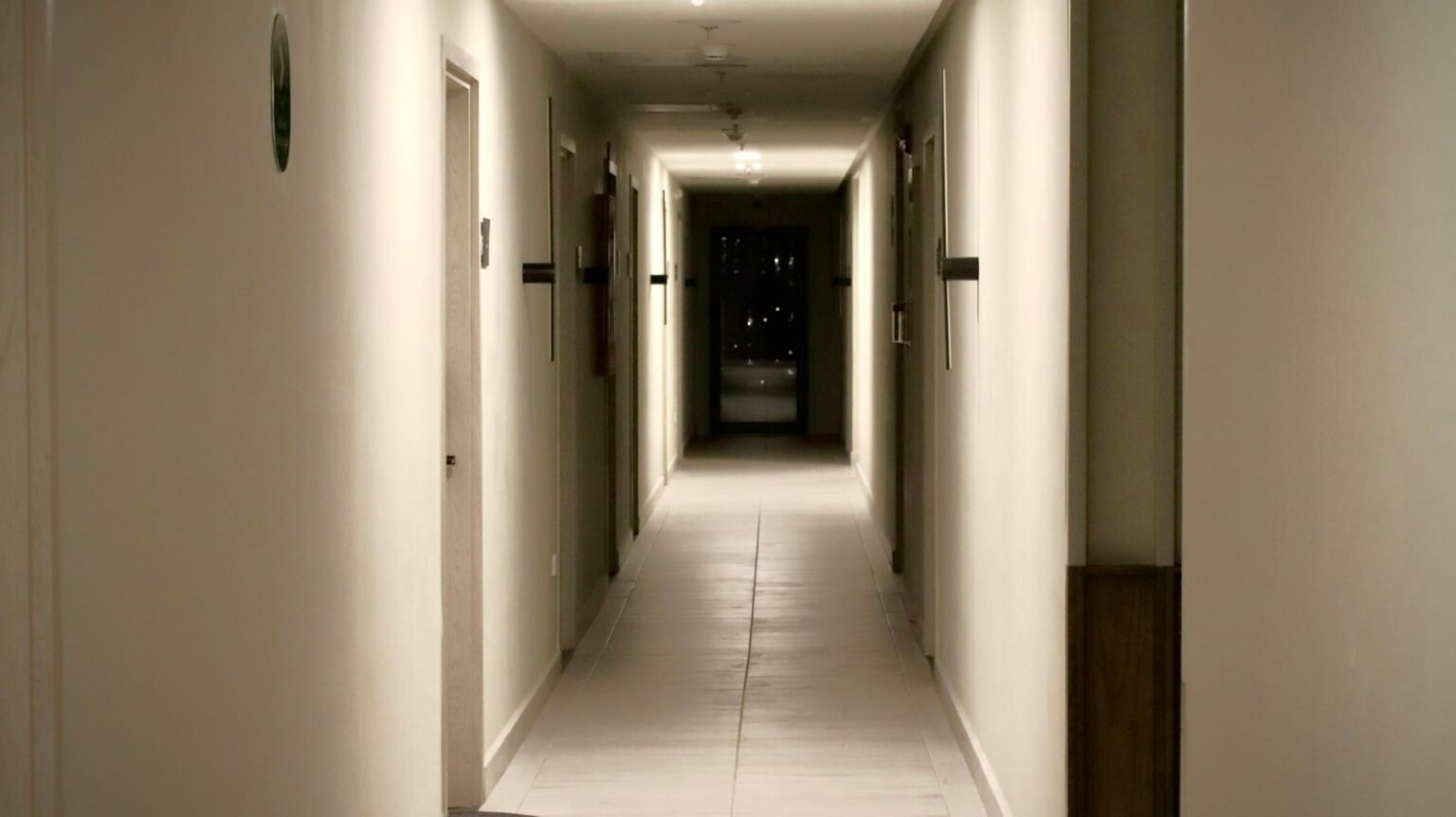 Hallway with doors on both sides