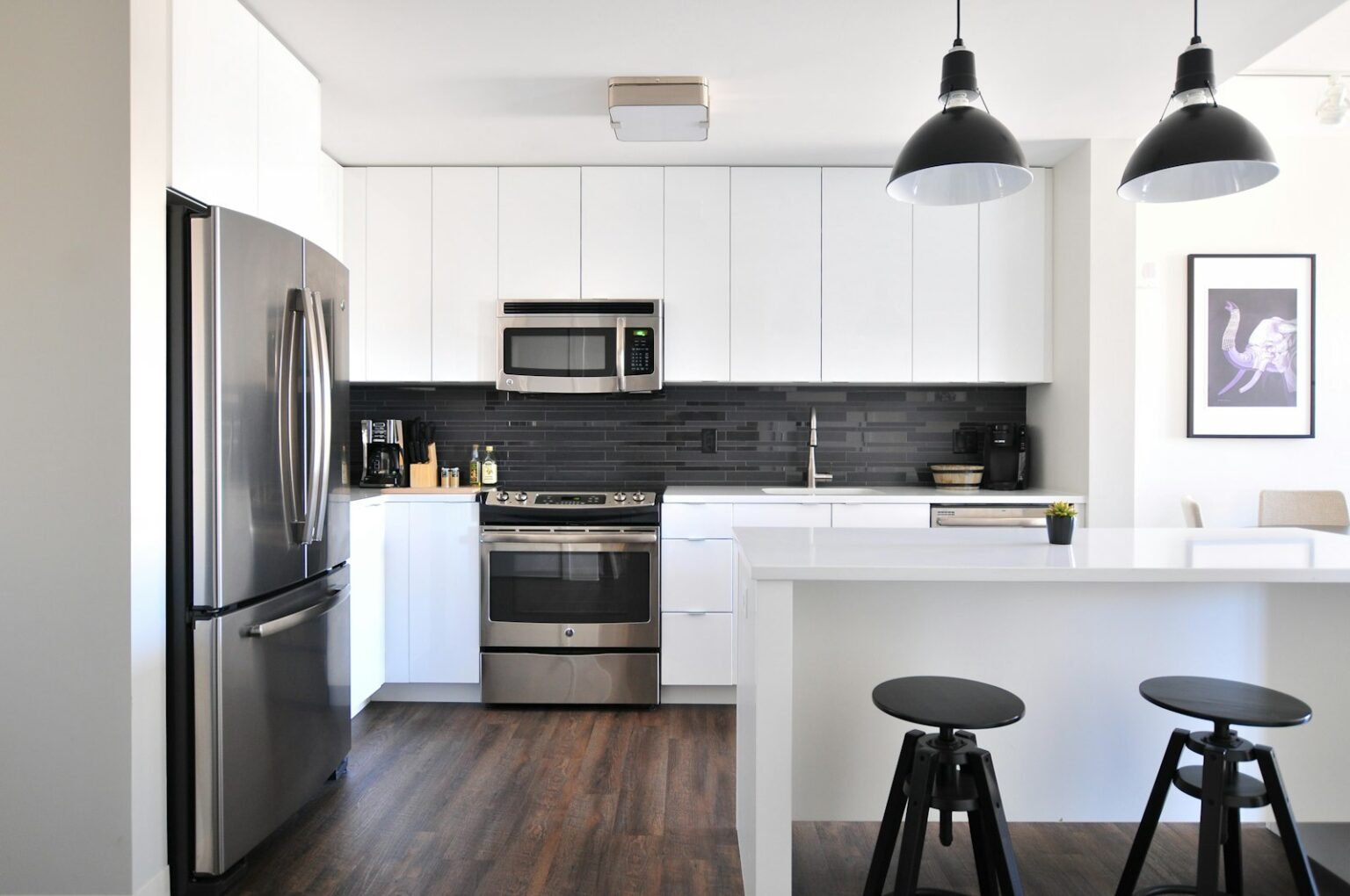 Questions to ask a landlord – Apartment kitchen with a steel refrigerator