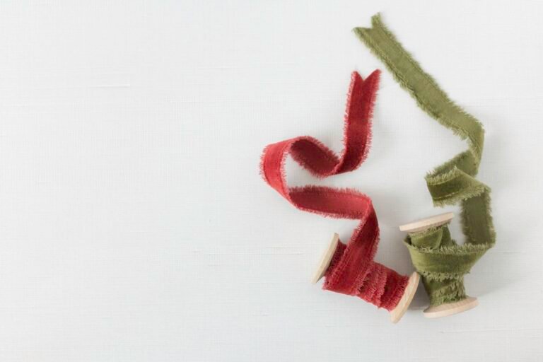 Spools of red and green velvet ribbon