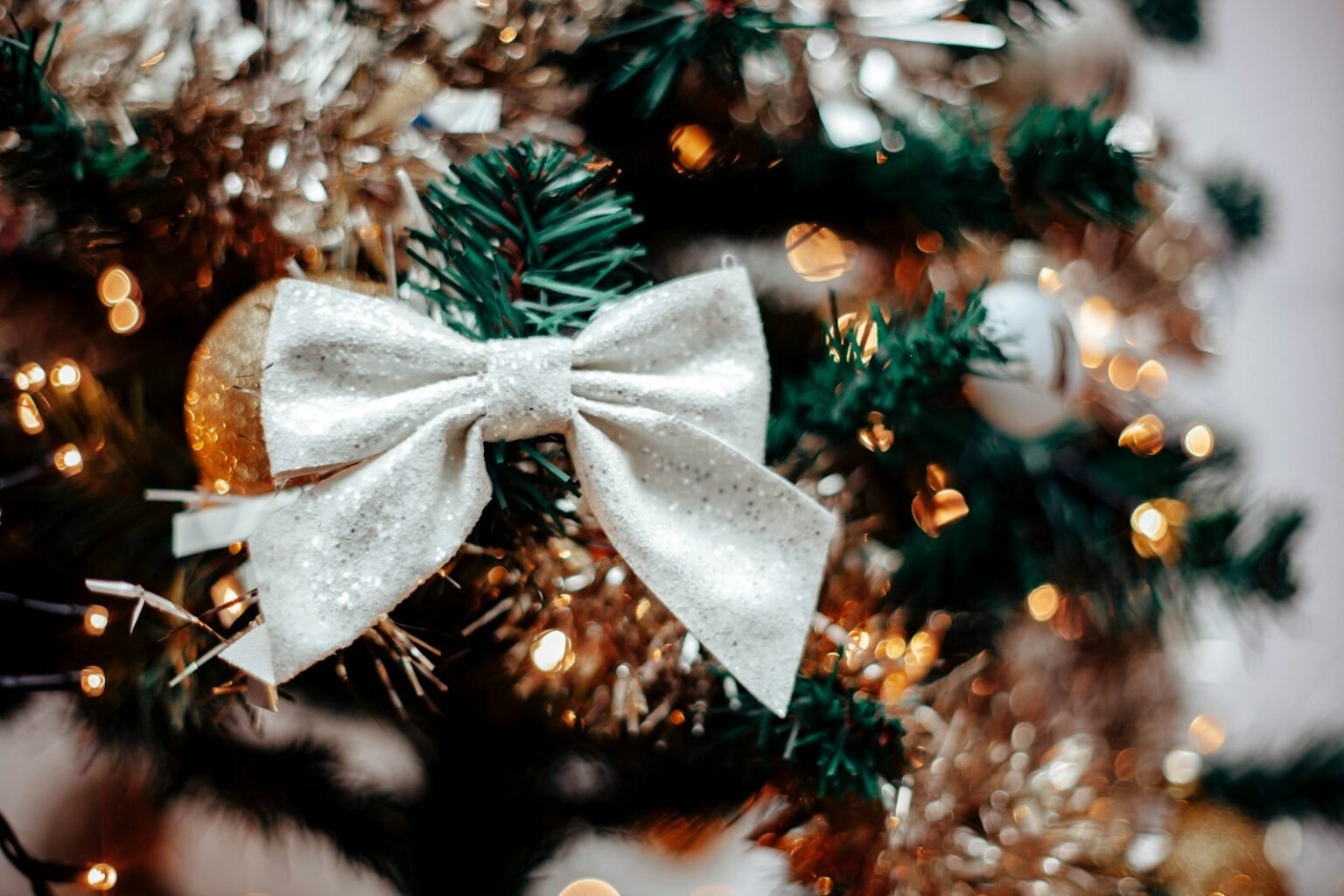 White bow on a Christmas tree