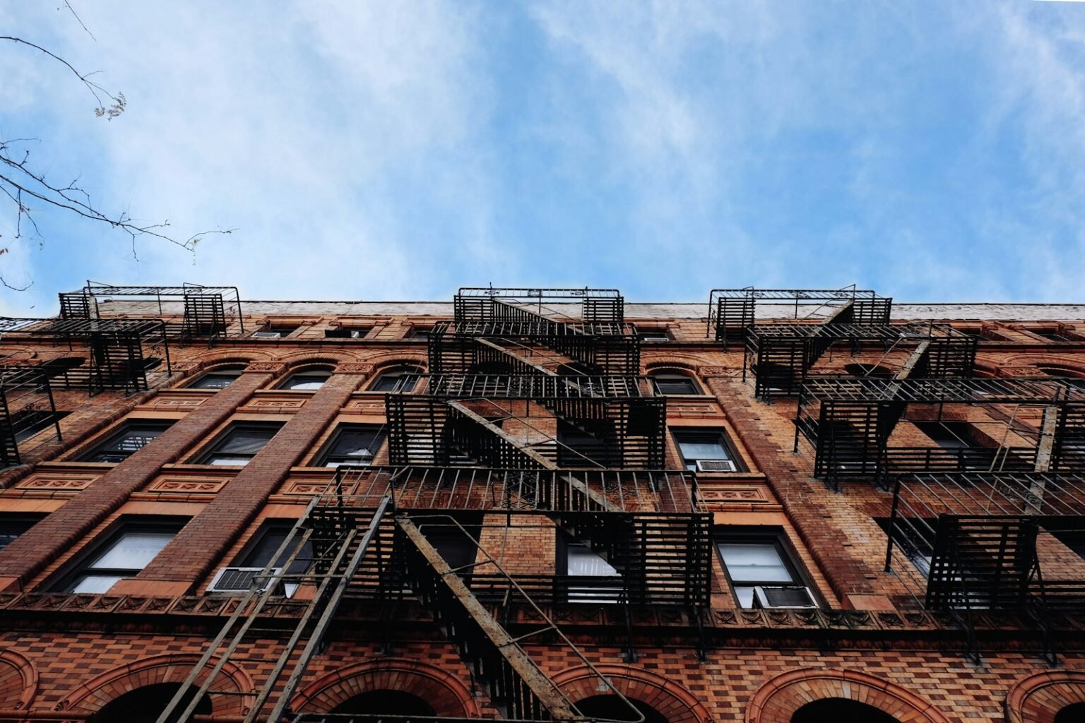 Average rent in NYC – Looking up at apartment buildings in New York