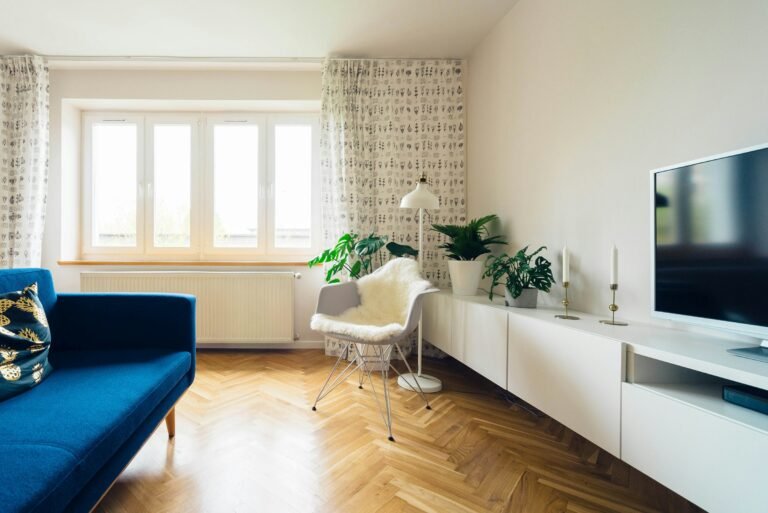 Apartment room with a monitor and plants