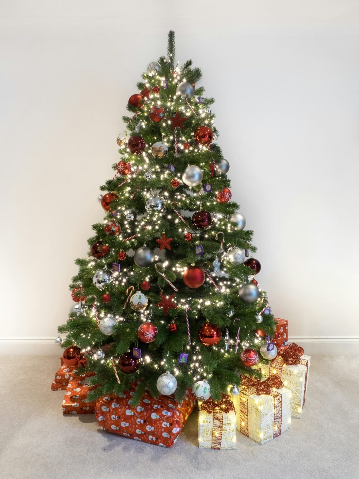Small Christmas tree with presents under it