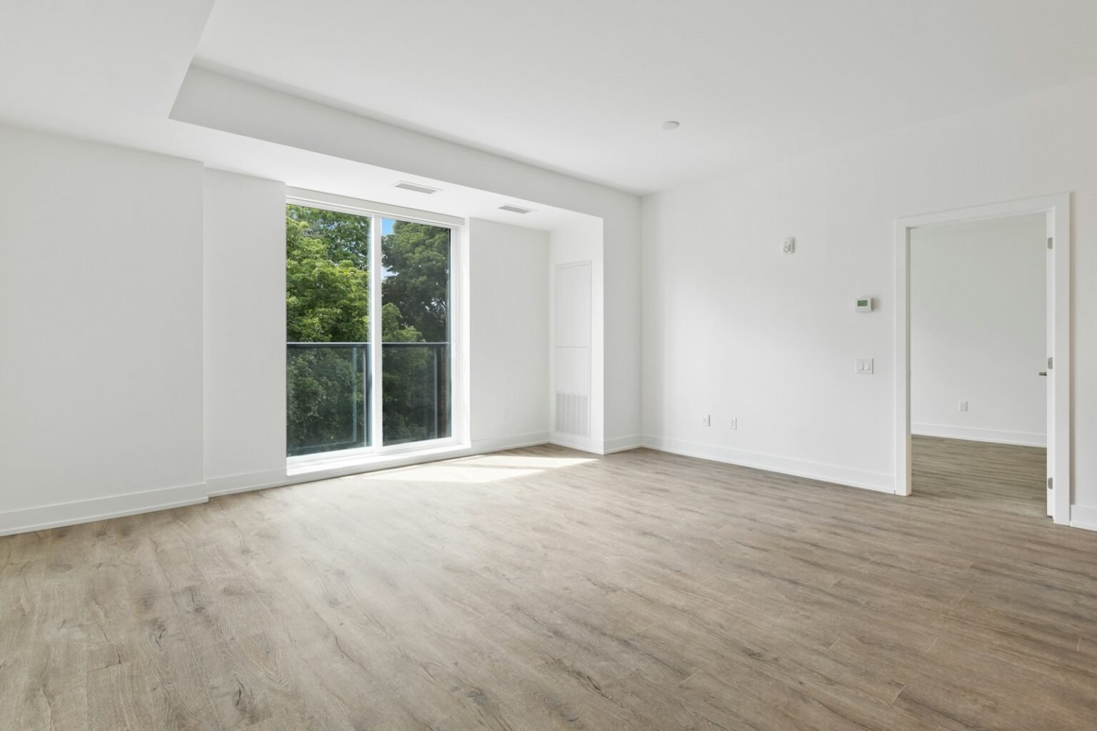 How much is a security deposit – White framed window in an empty room