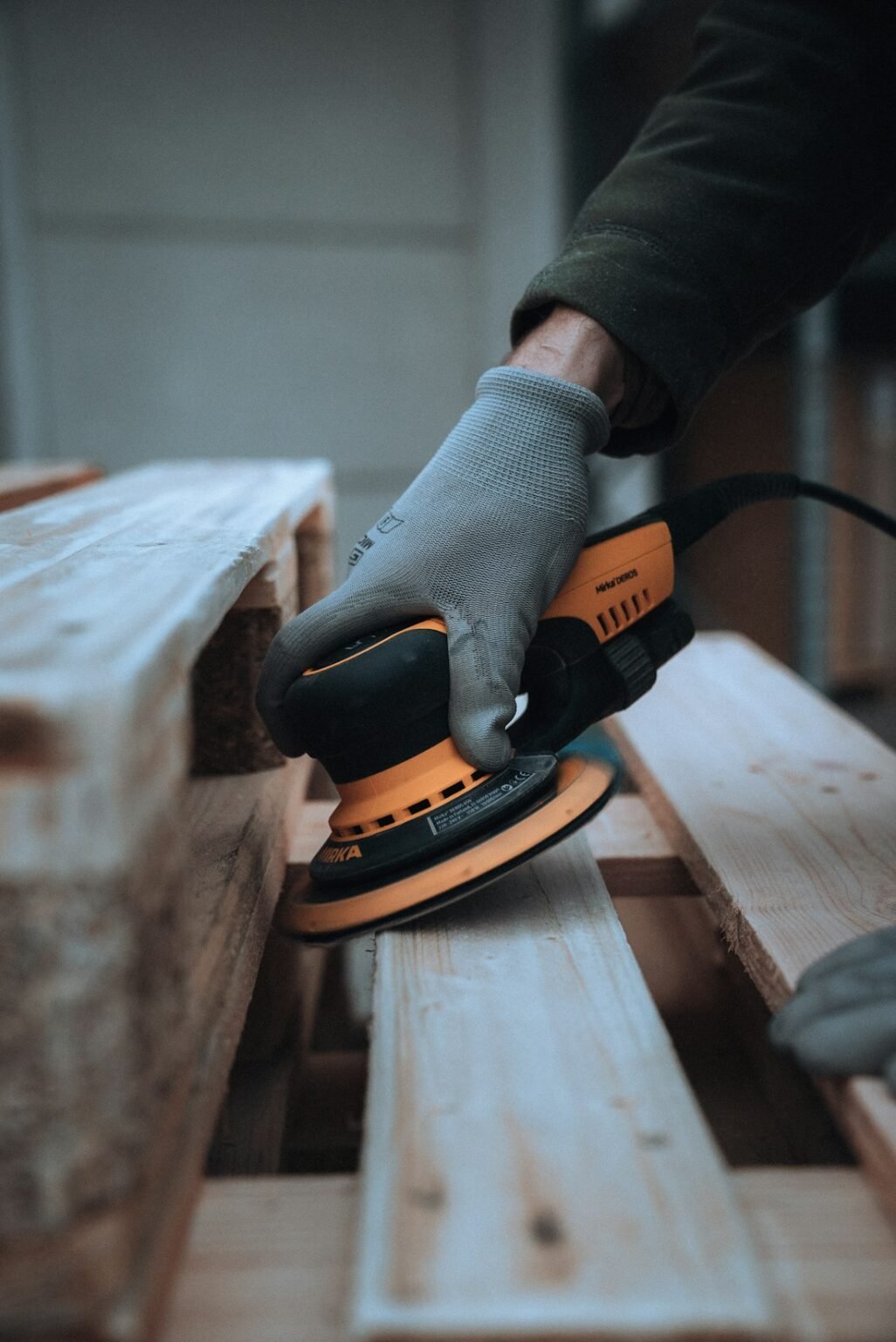 Orbital sander on wood