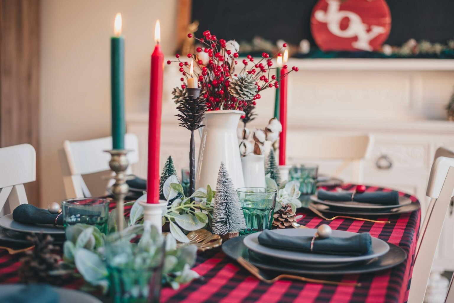 Red and white candles in glass holders