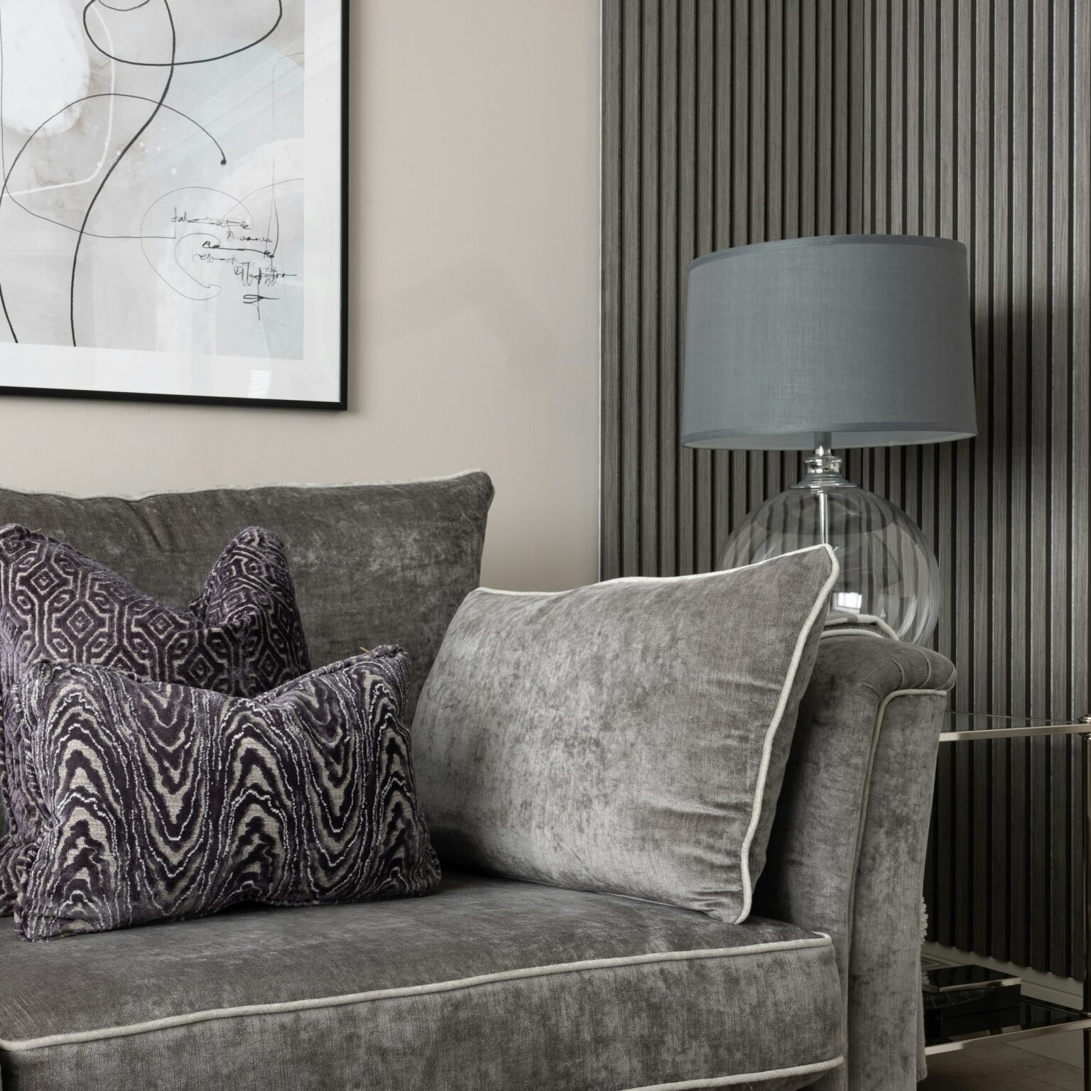 Living room with a couch and a lamp