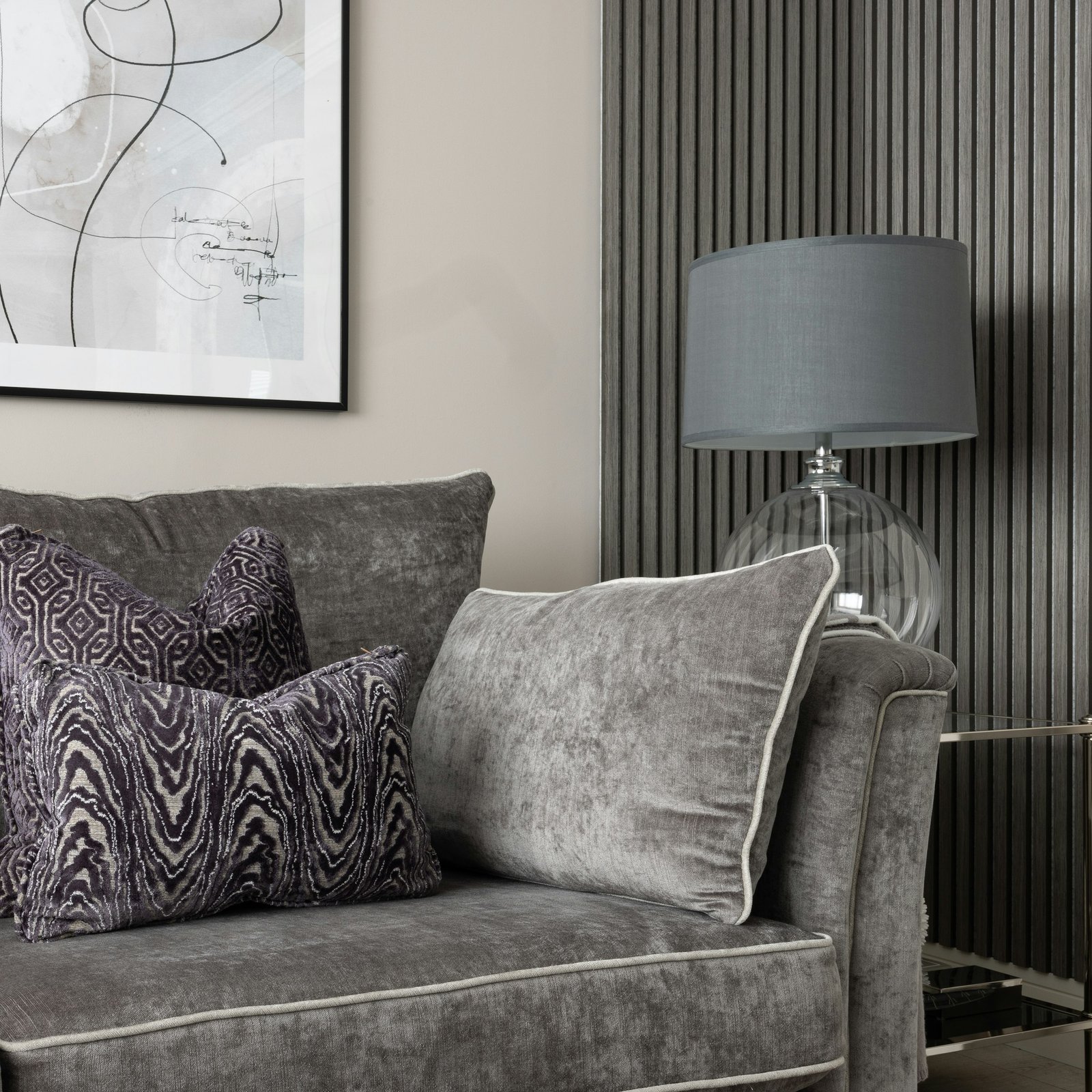 Living room with a couch and a lamp