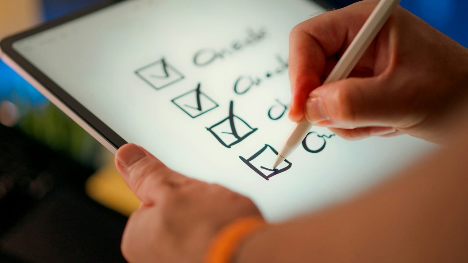 What do you need to rent an apartment – Hand marking off items on a checklist