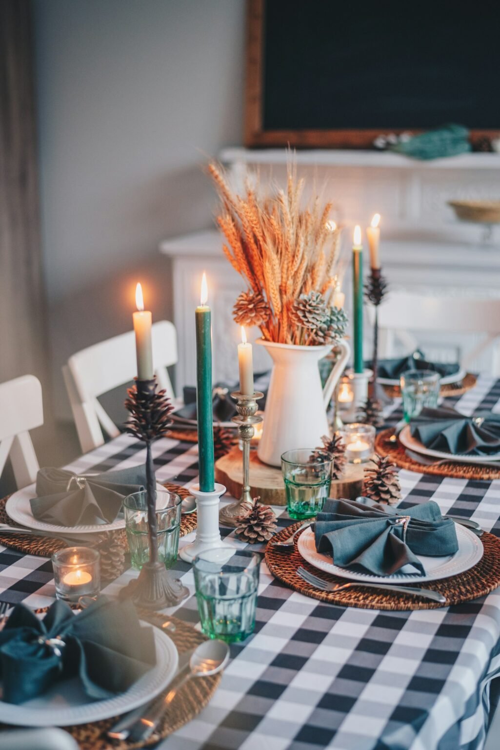 White candles on a wooden Thanksgiving table